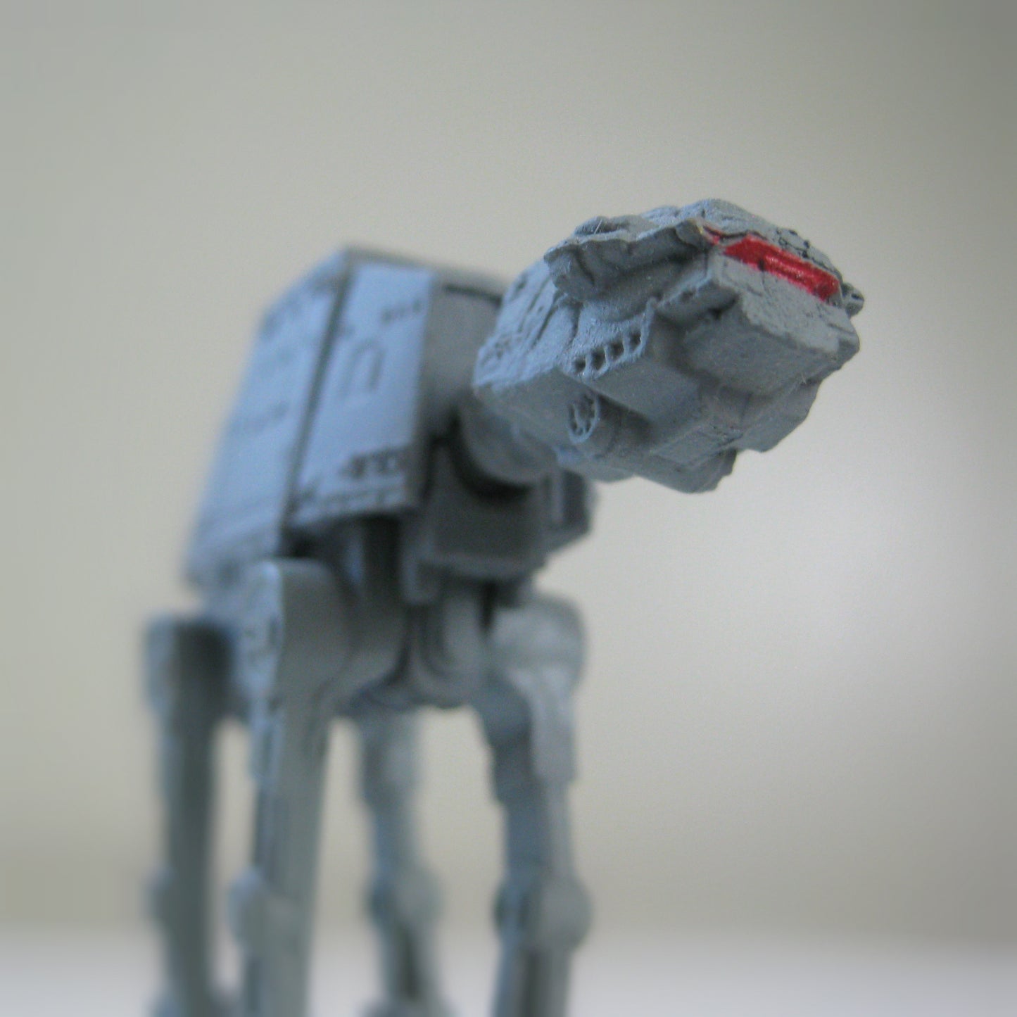Ground level view of a 2" miniature Star Wars Imperial AT-AT Walker toy model.