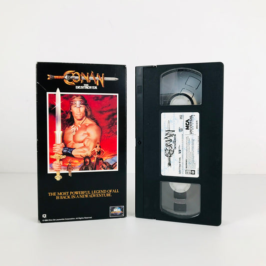 A VHS copy of the 1984 film, Conan The Destroyer, displayed with the VHS tape beside its cover.