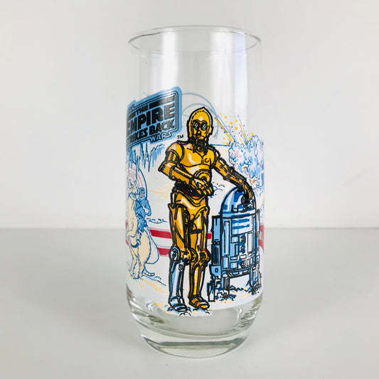 Front image of a 1980 Star Wars Burger King glass tumbler featuring R2-D2 and C-3PO.