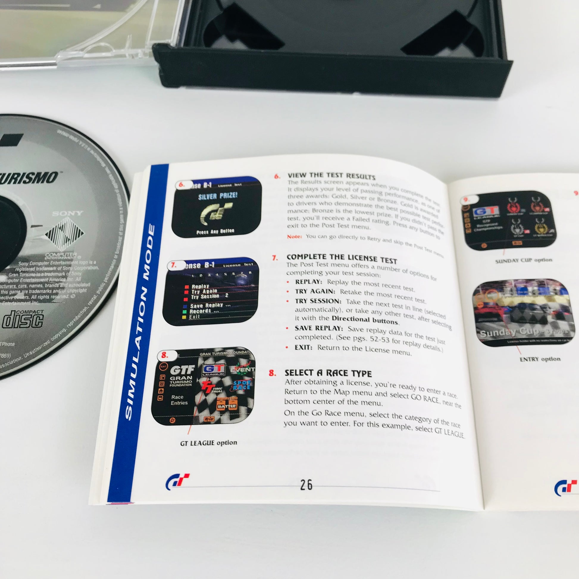 An inside look at the instructions booklet for the Gran Turismo PS1 video game.