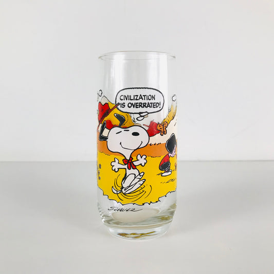 A camping-themed 1980s Peanuts McDonald's glass tumbler originally designed by Charles Schulz.