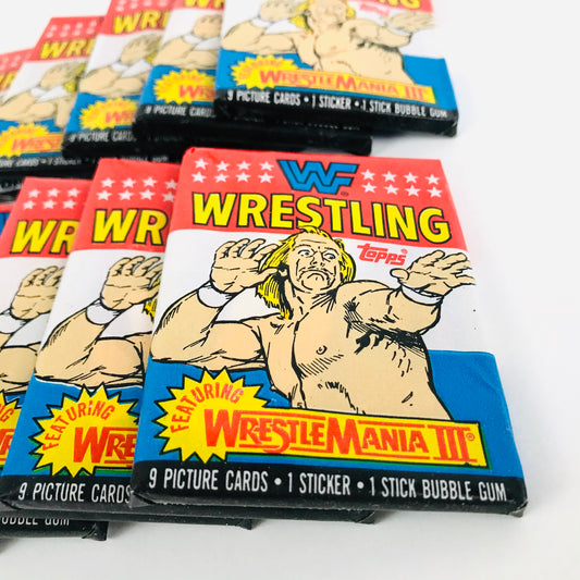 Several 1987 WWF Wrestlemania wax packs stacked together