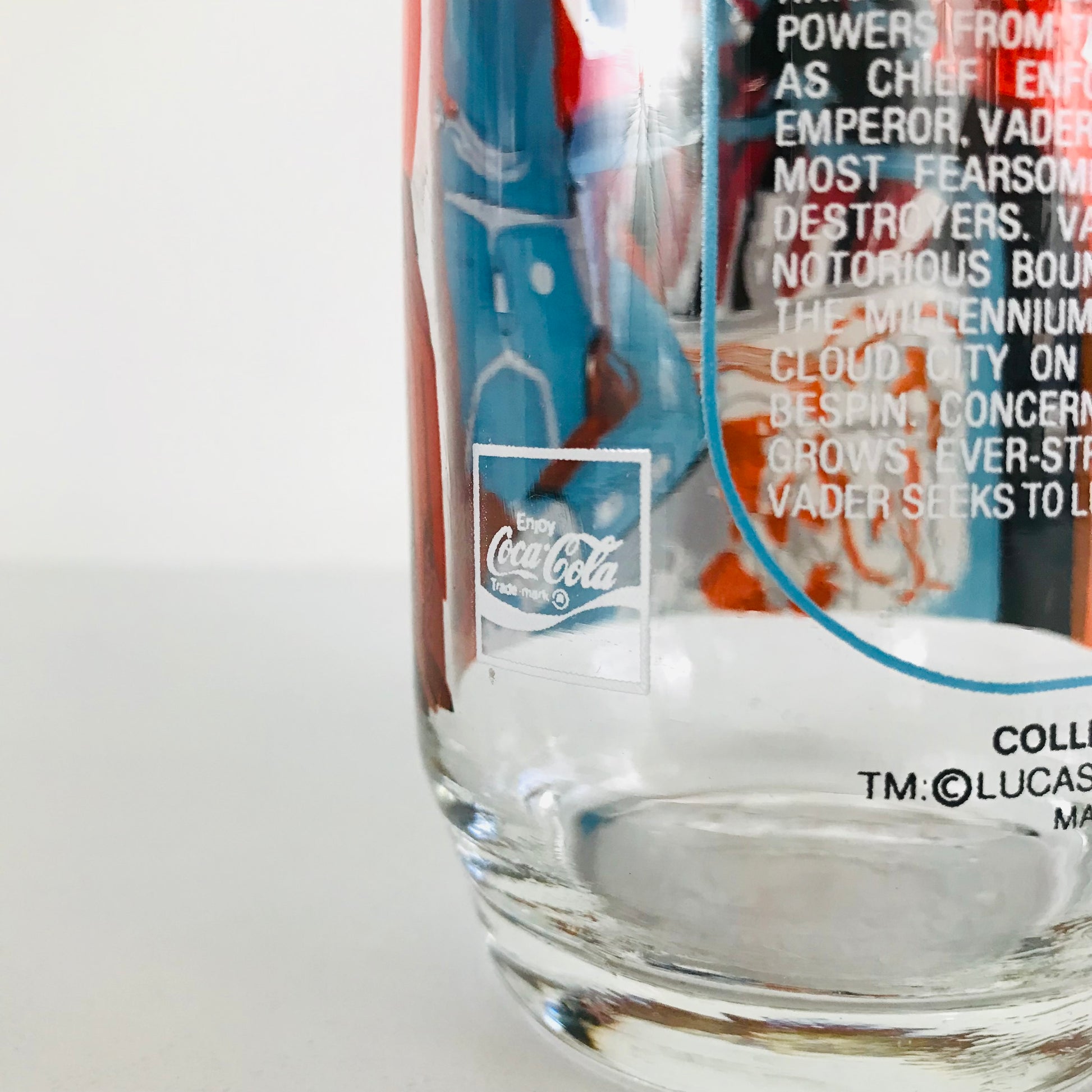 Coca-Cola logo on the back of a 1980 Star Wars Empire Strikes Back glass tumbler.