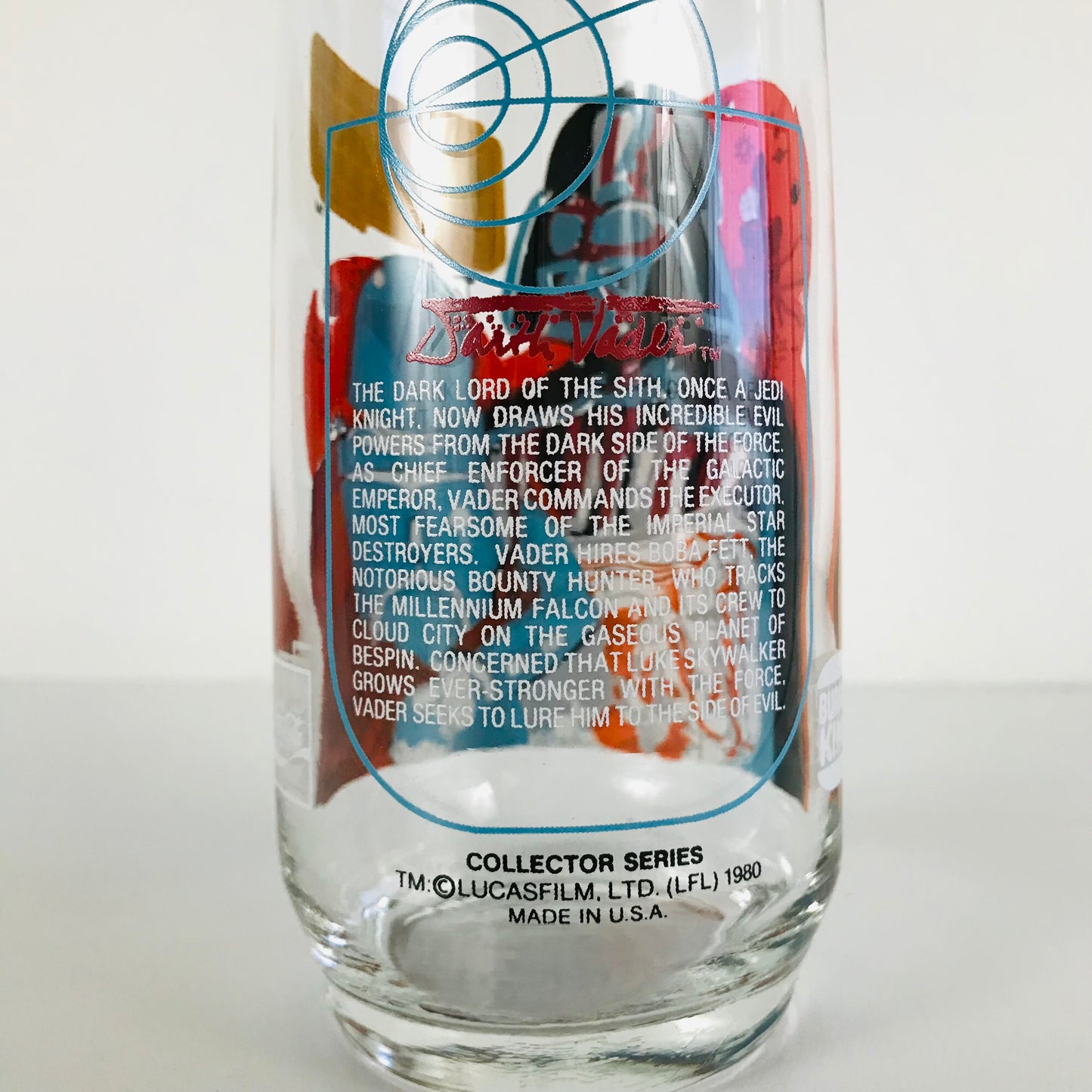 Back of a 1980 Star Wars Burger King glass tumbler detailing Darth Vader and his role in the Empire Strikes Back movie.