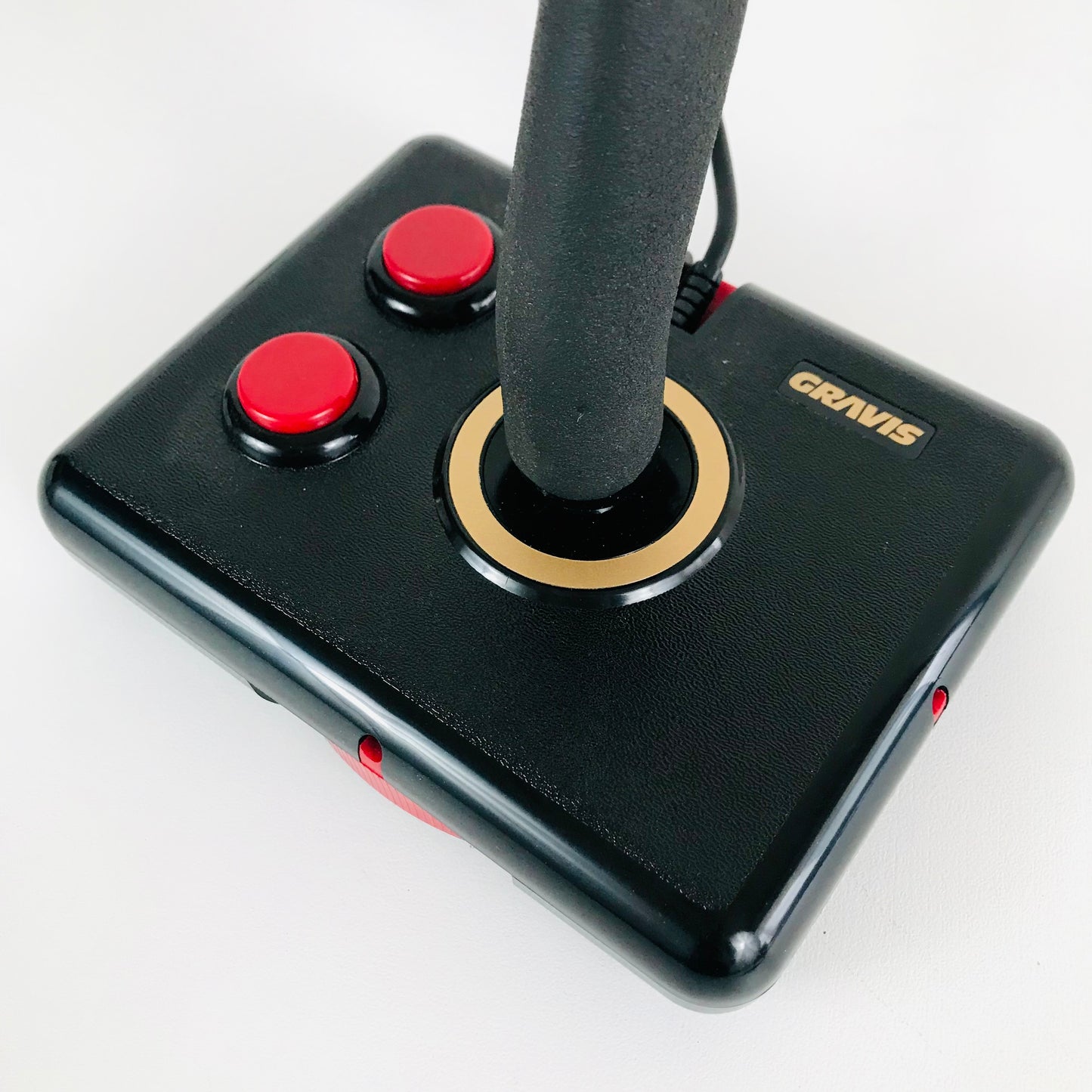 The vintage Gravis joystick came fully loaded with 3 firing buttons--a must for any computer gaming geek seeking high octane action.