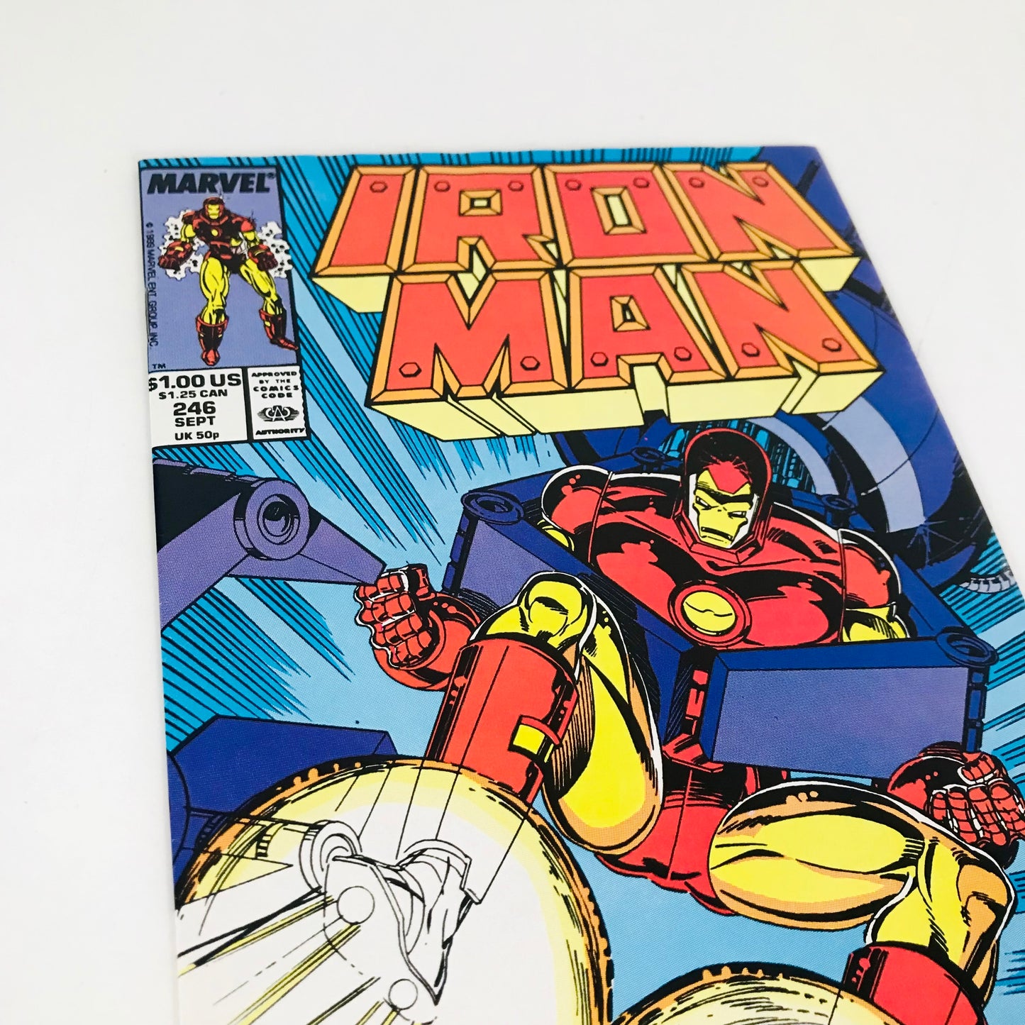 Close up look at the front cover for a 1989 Issue of an Iron Man comic book.