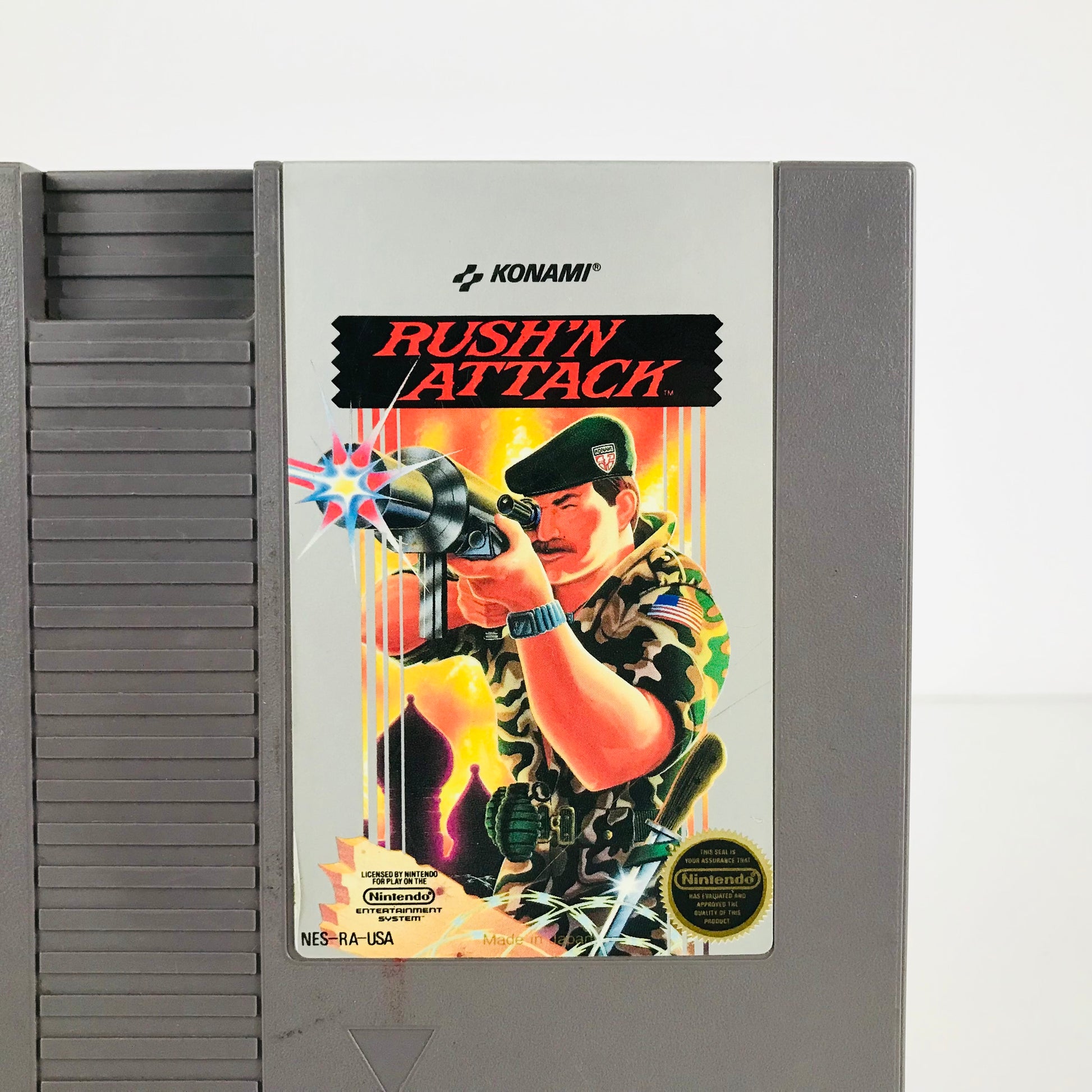 Front label image of the classic 1985 Nintendo NES video game, "Rush'n Attack".