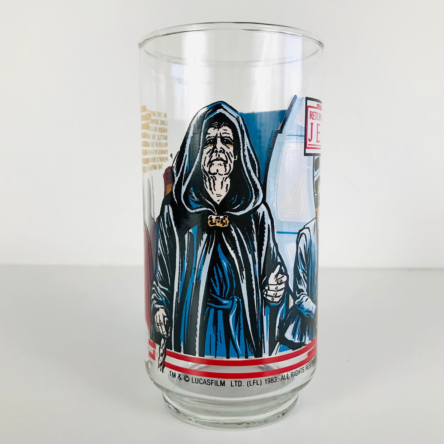 A creepy image of Emperor Palpatine on the side of a vintage Star Wars drinking glass.