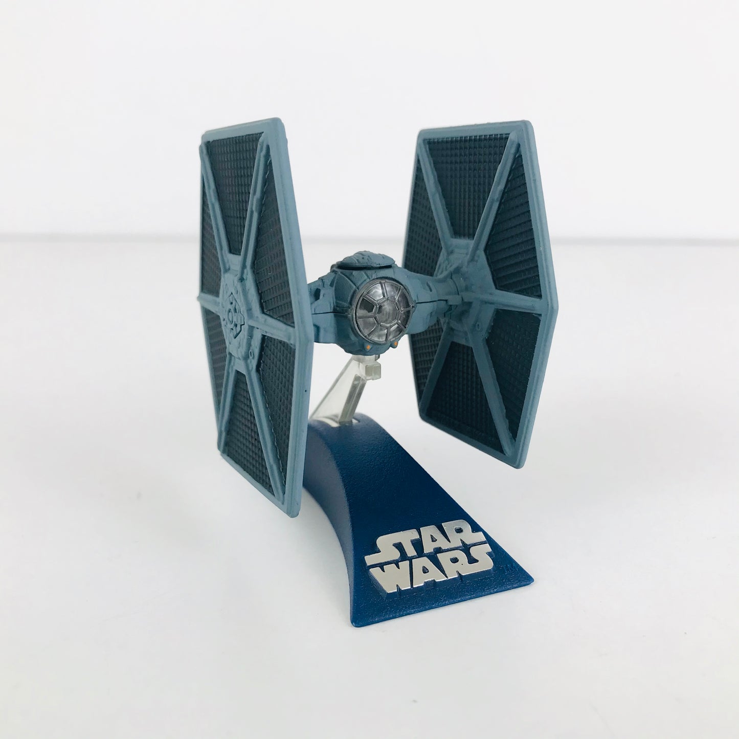 Front facing view of a heavy duty die cast metal TIE Fighter toy model.