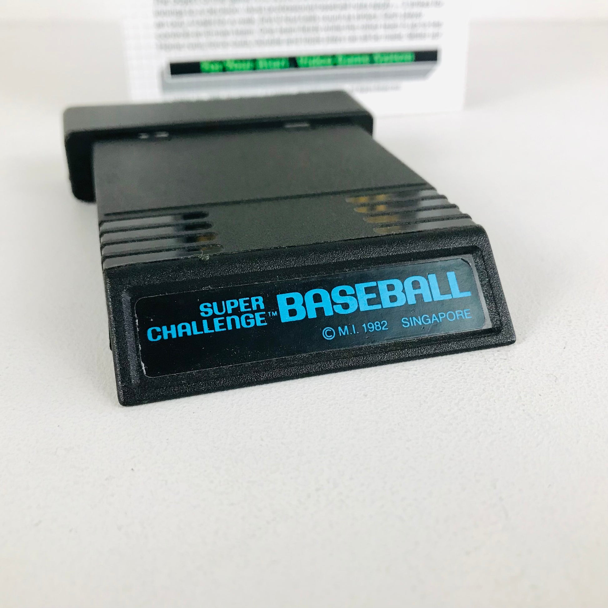 Close up image of the front label for the 1982 Atari game, Super Challenge Baseball